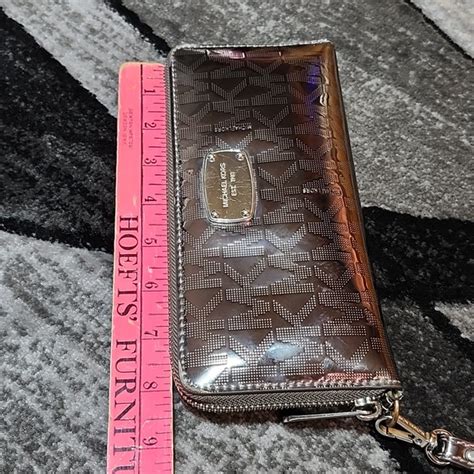 michael kors mirror metallic wristlet|Michael Kors wristlet wallet black.